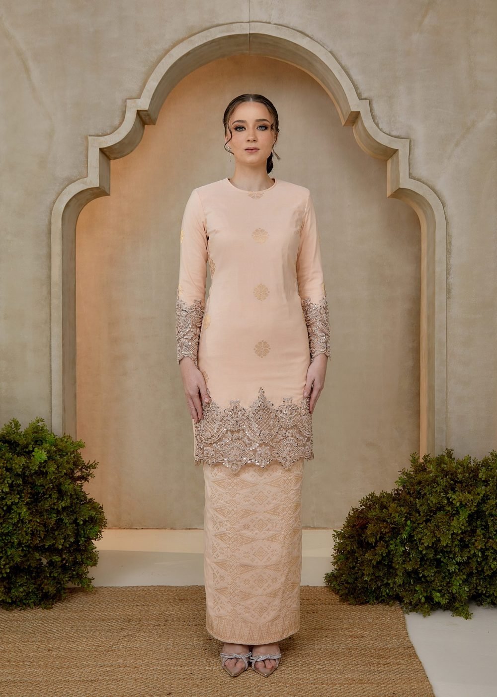 Seroja Songket Kurung in Salmon