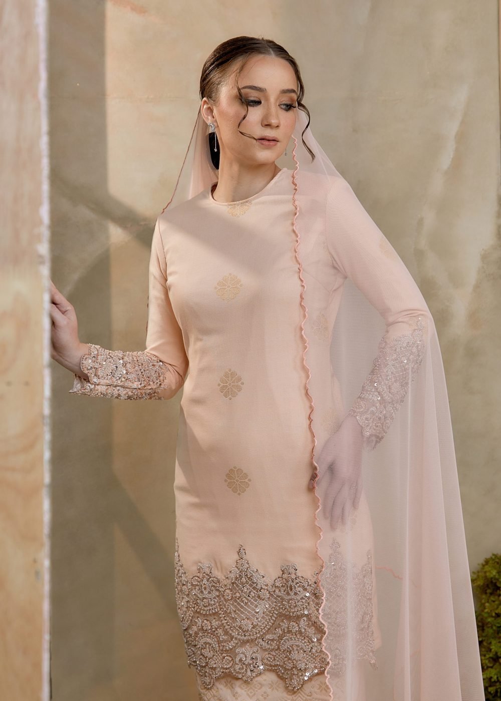 Seroja Songket Kurung in Salmon