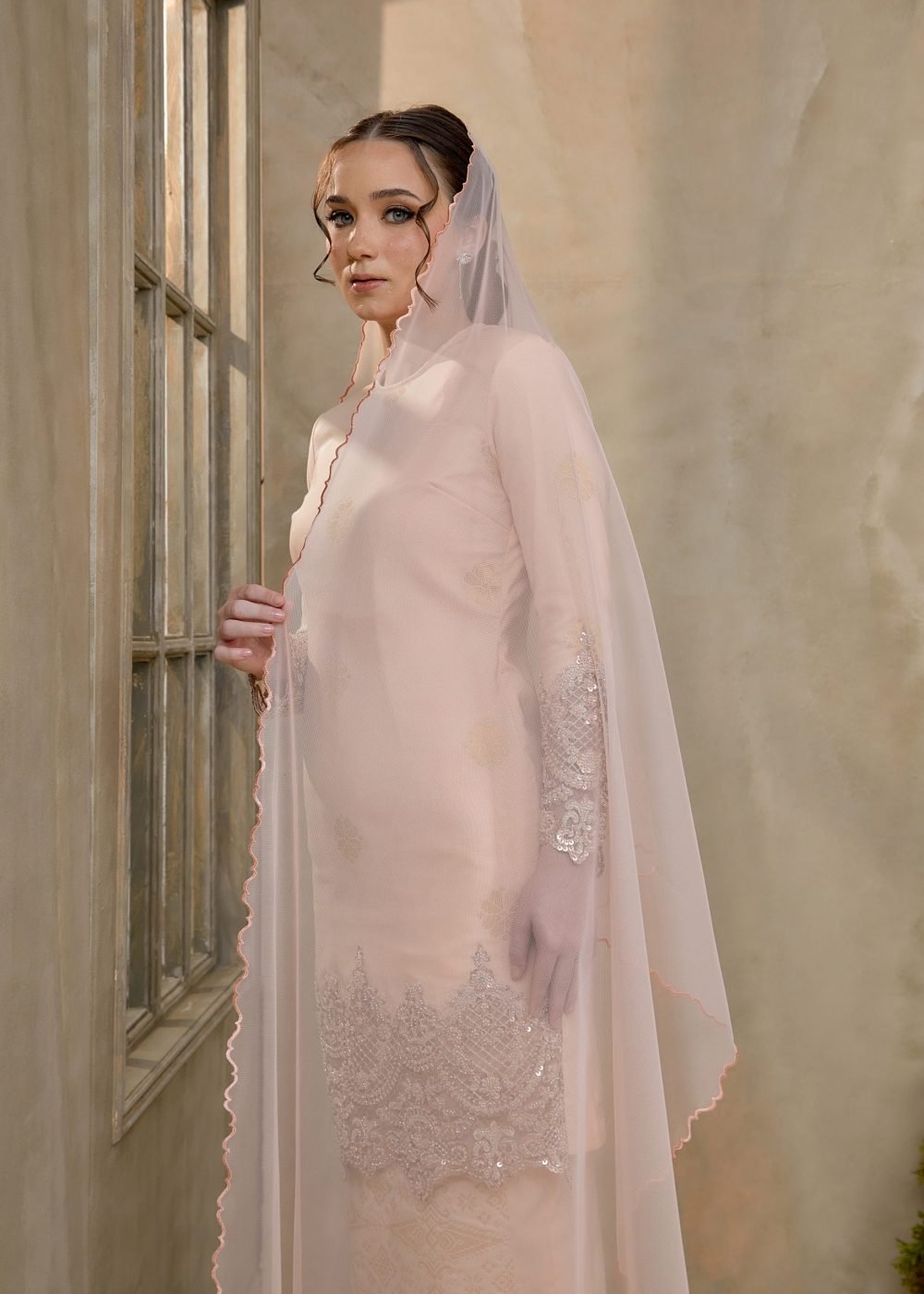 Seroja Songket Kurung in Salmon